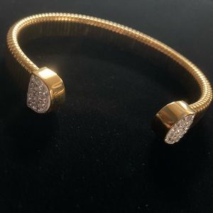 Gold plate cuff bracelet. Slips on with ease Bling Ends are 1/2” 21 crystals per